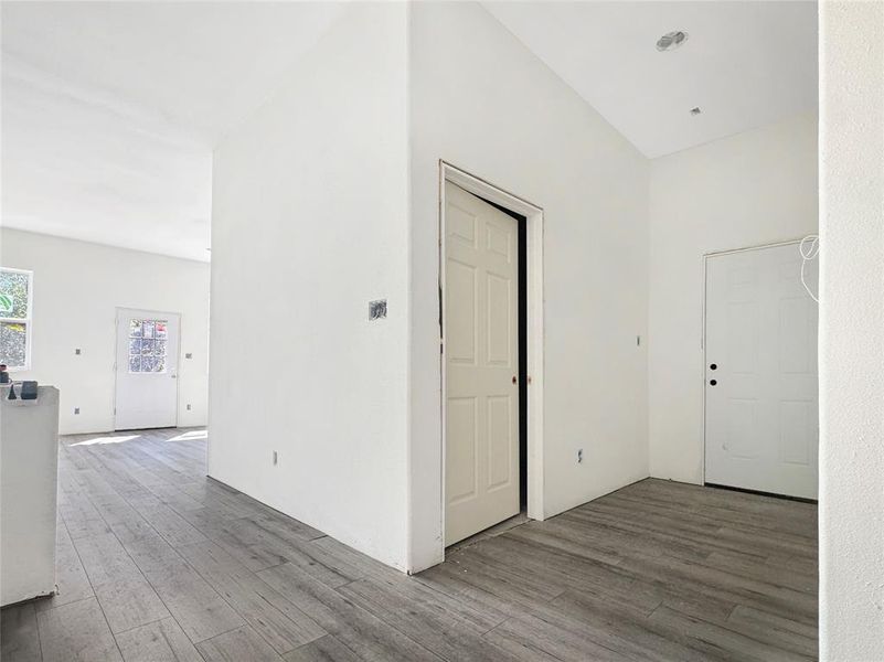 Unfurnished room featuring wood finished floors Unfurnished room featuring wood finished floors