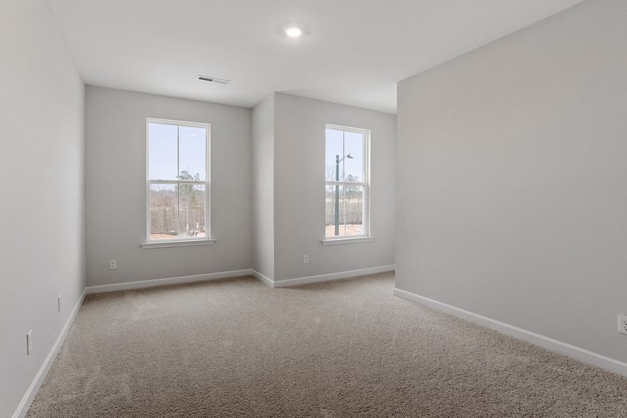 Spacious, unfurnished interior of a new home in Ovation at Sweetbrier, Durham (Image 23).