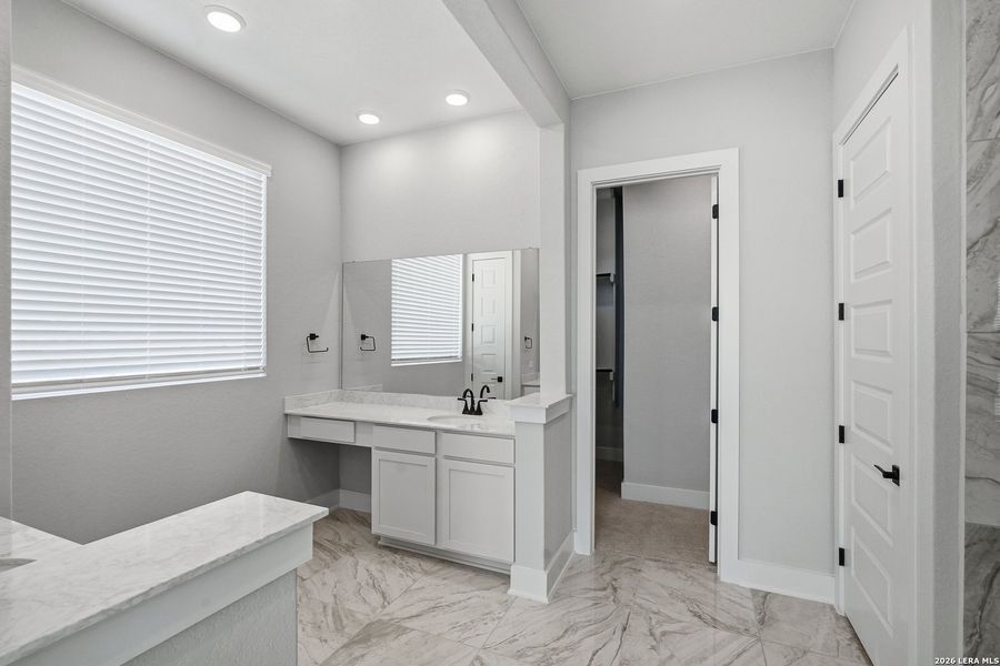 Furnished interior view inside a new home in Potranco Oaks, Castroville (Image 19).