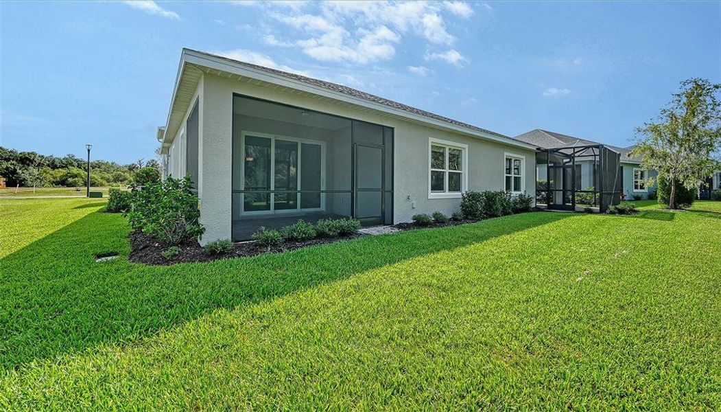 Exterior details and patio area of a home in Wildleaf at North River Ranch, Parrish (Image 18). Exterior details and patio area of a home in Wildleaf at North River Ranch, Parrish (Image 18).