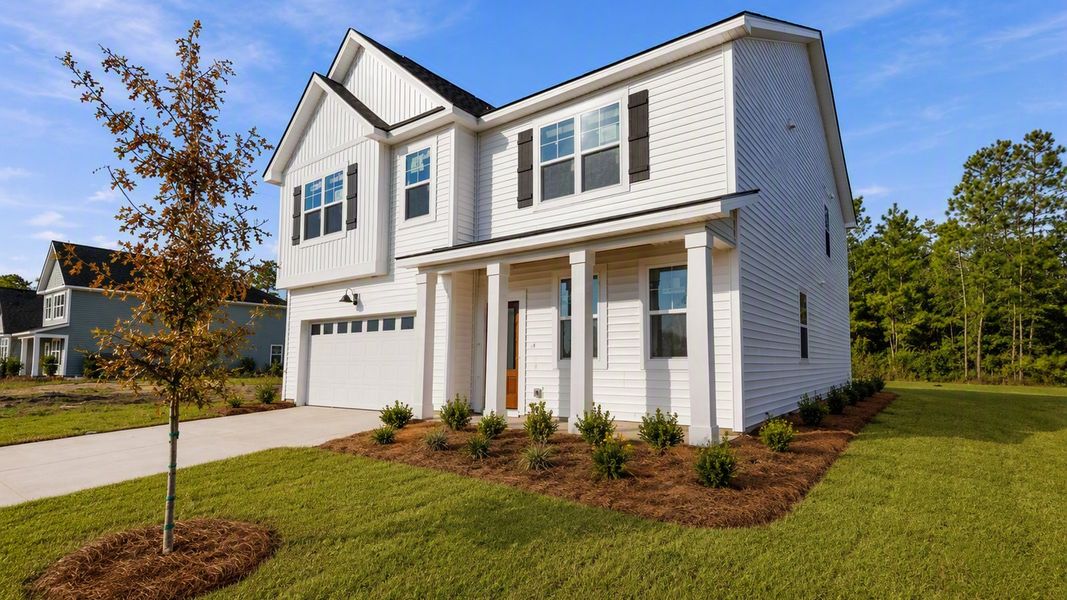 Representative exterior photo of a completed home built from the Hanover by D.R. Horton in Laurel Grove, Guyton, GA (Image 2). Representative exterior photo of a completed home built from the Hanover by D.R. Horton in Laurel Grove, Guyton, GA (Image 2).