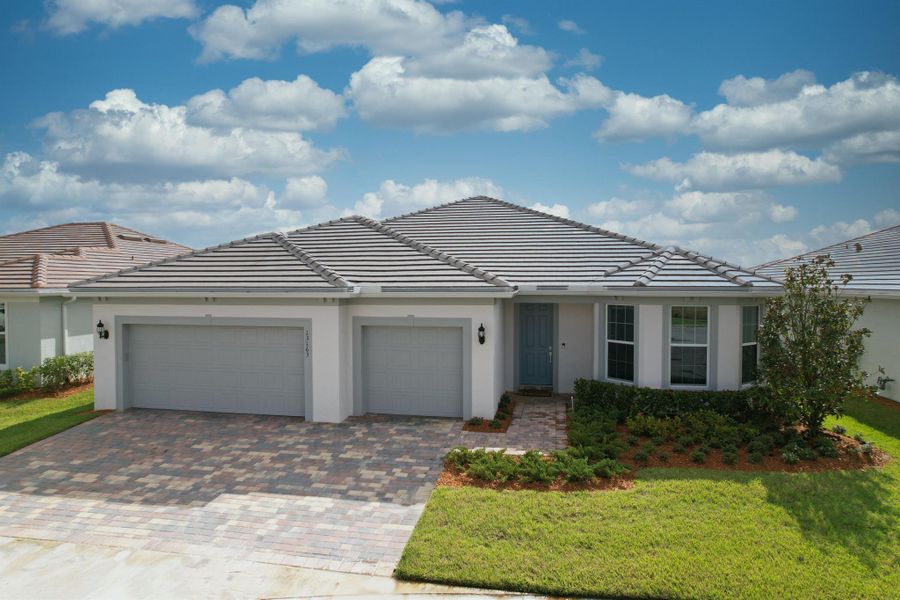 Front exterior of a new home in Del Webb Tradition, Port St. Lucie, FL, highlighting curb appeal (Image 21).