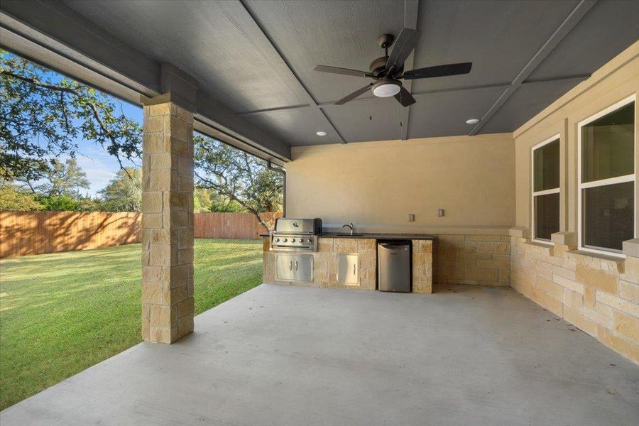 View of patio / terrace featuring ceiling fan and a sink View of patio / terrace featuring ceiling fan and a sink
