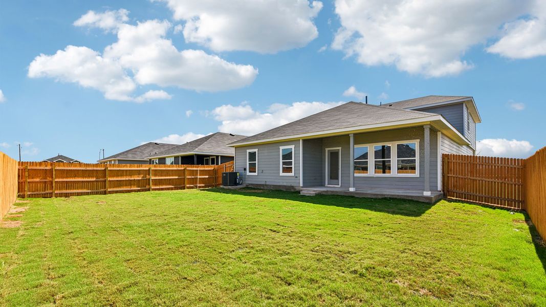 Exterior details and patio area of a home in Monarch Ranch, Manor (Image 25).