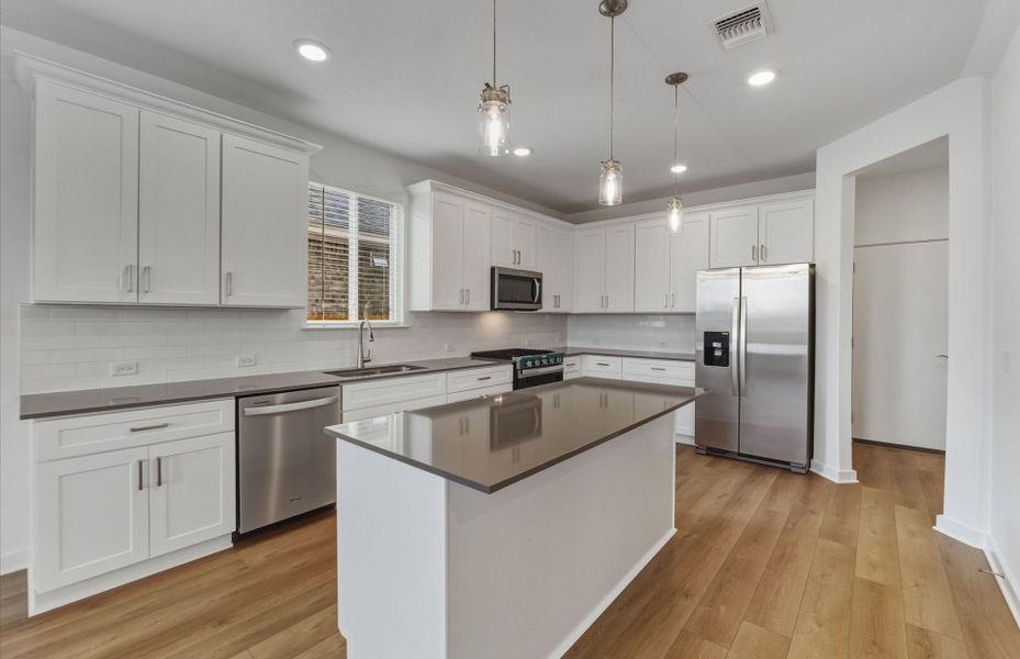 Furnished interior view inside a new home in Crosswinds, Kyle (Image 6).