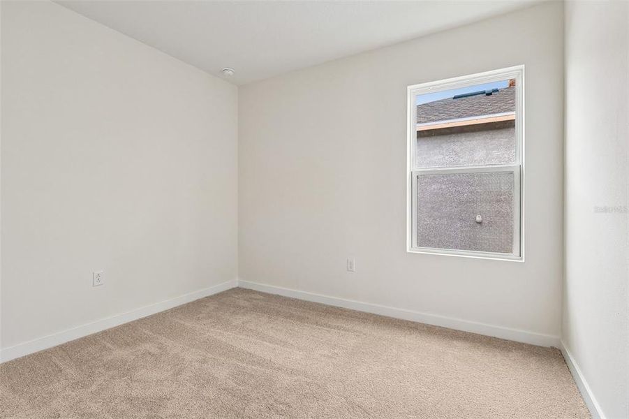 Spacious, unfurnished interior of a new home in Liberty Trace, Haines City (Image 25).