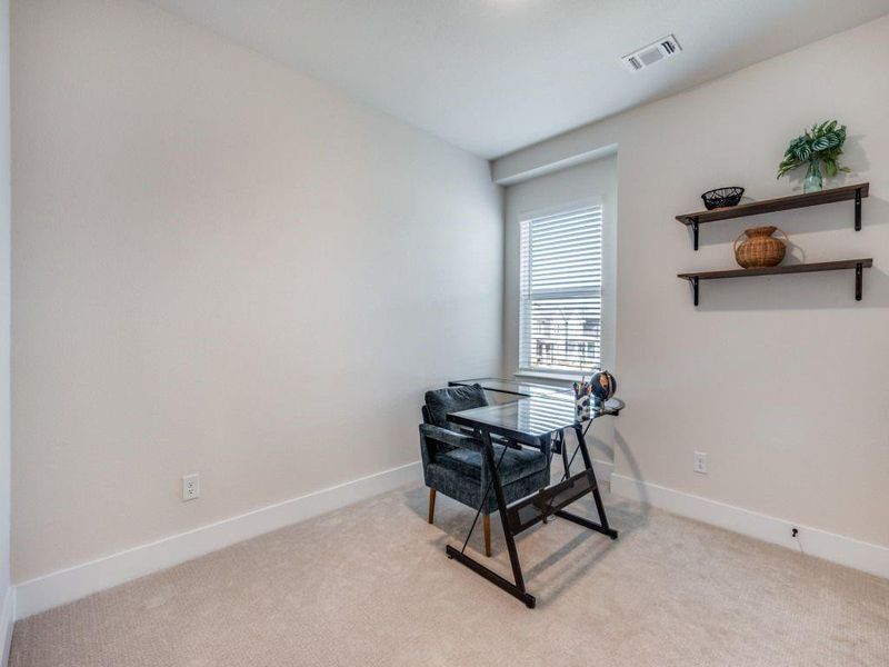 Furnished interior view inside a new home in Terrace Collection at Harvest, Argyle (Image 17).