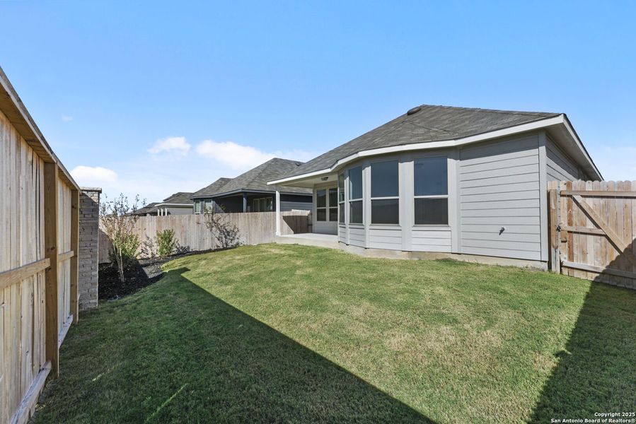 Exterior details and patio area of a home in Lily Springs, Seguin (Image 3).