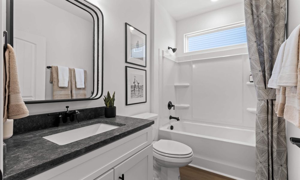 Representative furnished interior of a home built from the The Redbud by Chesapeake Homes in The Willows, Loris (Image 42).