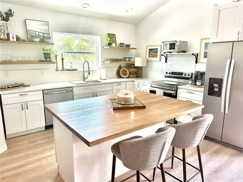 Furnished interior view inside a new home in , Sarasota (Image 3).