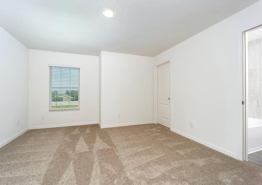 The secondary bathroom with its own bathroom and walk-in closet