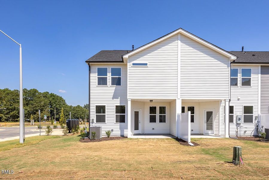 Front exterior of a new home in Springvale, Fuquay Varina, NC, highlighting curb appeal (Image 2).