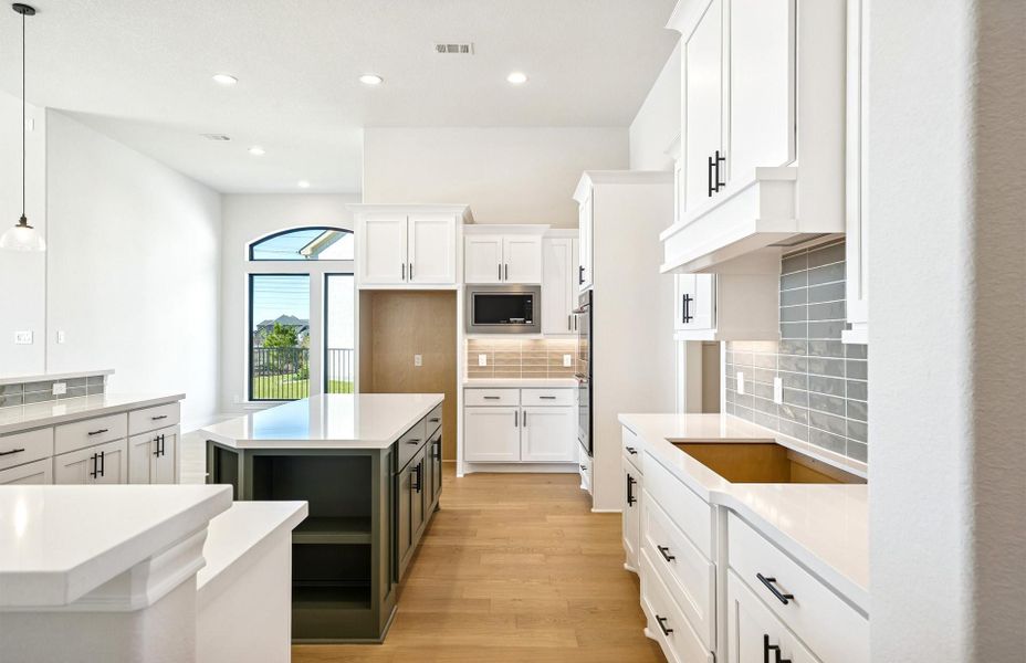 Furnished interior view inside a new home in Bridgeland 60′, Cypress (Image 13).