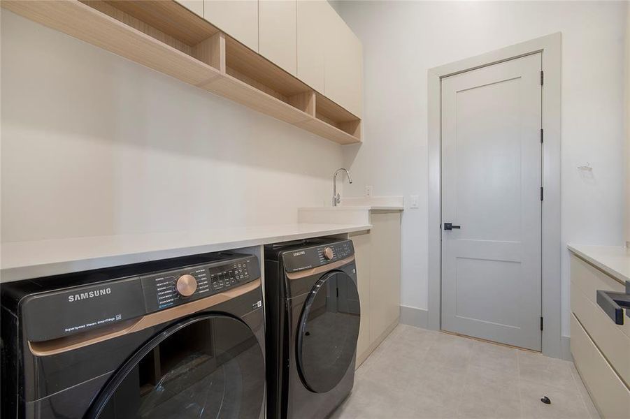 Laundry area featuring washing machine and dryer
