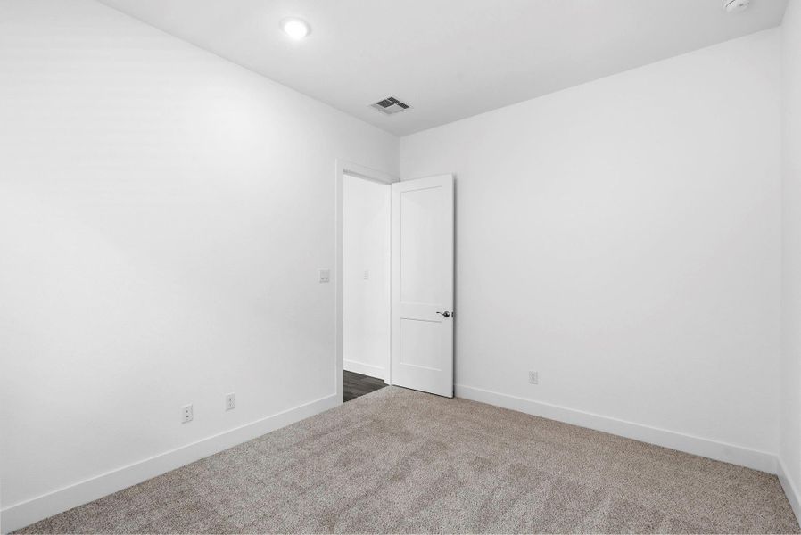 Spacious, unfurnished interior of a new home in Meridiana, Manvel (Image 16).