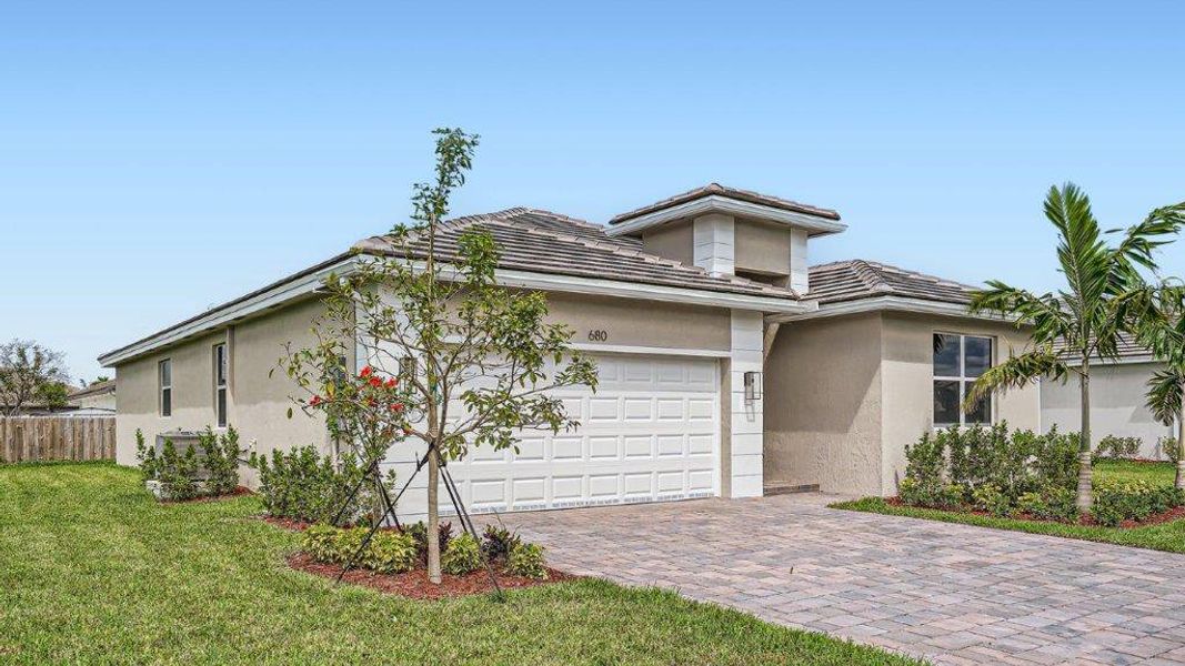 Representative exterior photo of a completed home built from the Davenport by D.R. Horton in Messina Place, Homestead, FL (Image 25). Representative exterior photo of a completed home built from the Davenport by D.R. Horton in Messina Place, Homestead, FL (Image 25).