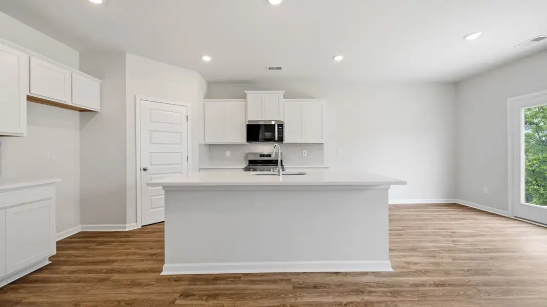 Furnished interior view inside a new home in The Preserve at Agricultural Village, Perry (Image 4).