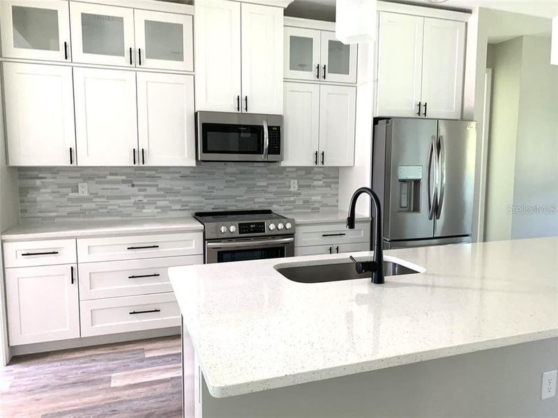 Furnished interior view inside a new home in , Port Charlotte (Image 8).