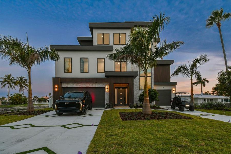 Front exterior of a new home in , Treasure Island, FL, highlighting curb appeal (Image 32). Front exterior of a new home in , Treasure Island, FL, highlighting curb appeal (Image 32).