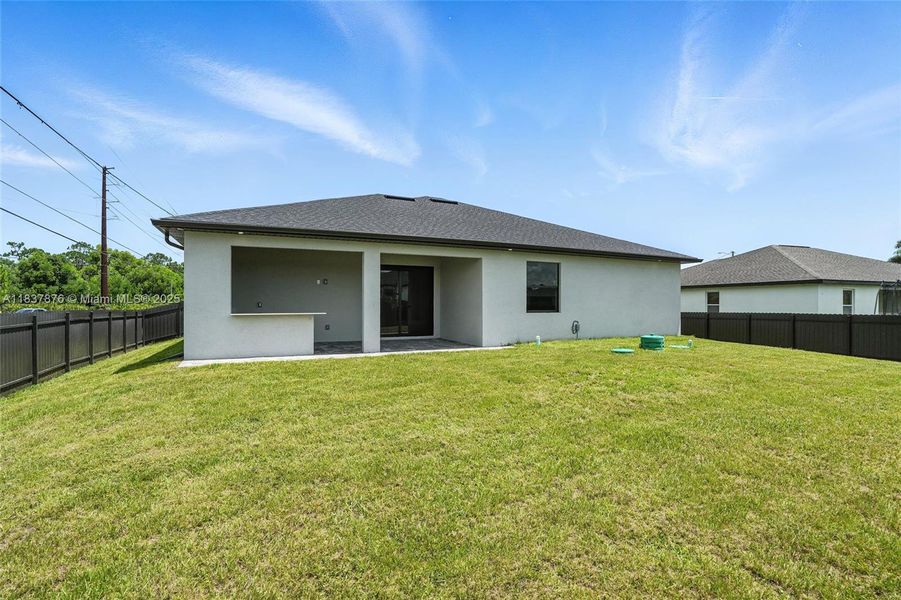 Front exterior of a new home in , Cape Coral, FL, highlighting curb appeal (Image 2). Front exterior of a new home in , Cape Coral, FL, highlighting curb appeal (Image 2).