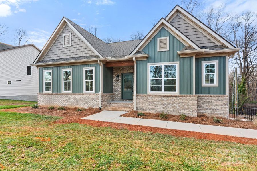 Front exterior of a new home in , Winston-Salem, NC, highlighting curb appeal (Image 23). Front exterior of a new home in , Winston-Salem, NC, highlighting curb appeal (Image 23).