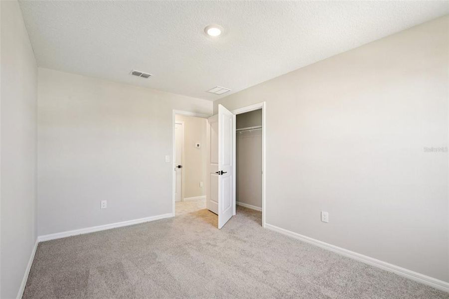 Spacious, unfurnished interior of a new home in Berry Bay, Wimauma (Image 29).