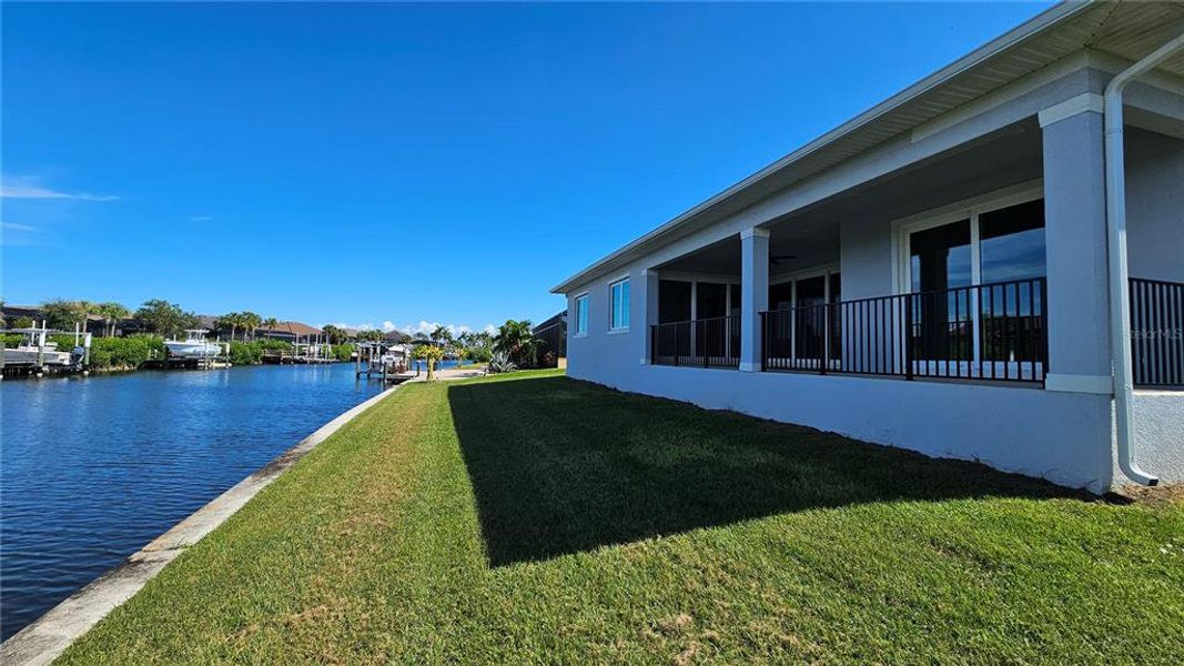 Exterior details and patio area of a home in , Port Charlotte (Image 1).