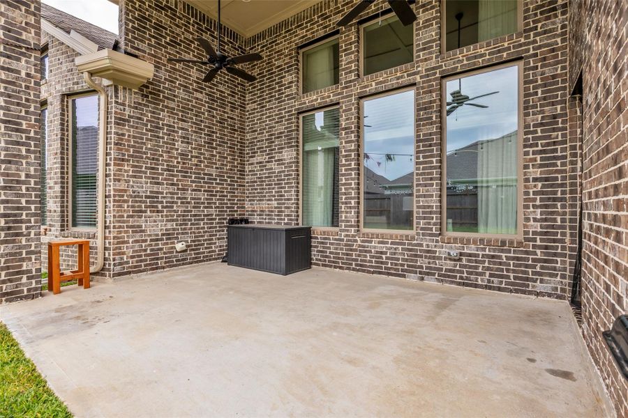 Exterior details and patio area of a home in , Conroe (Image 25).