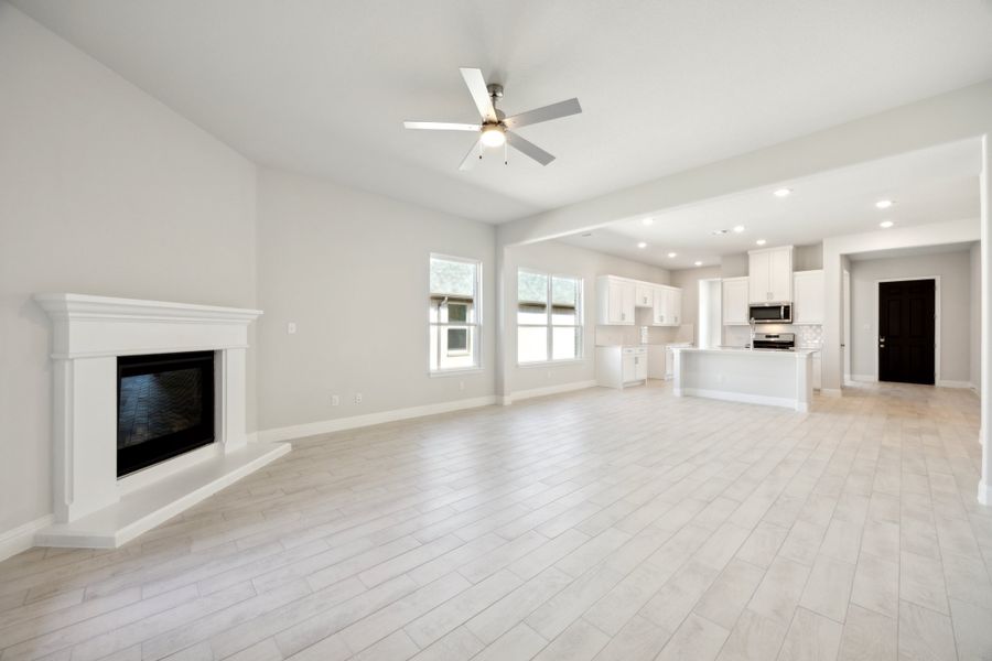 Representative unfurnished interior of a home built from the Waverly III by Megatel Homes in Bellagio, Forney (Image 9).
