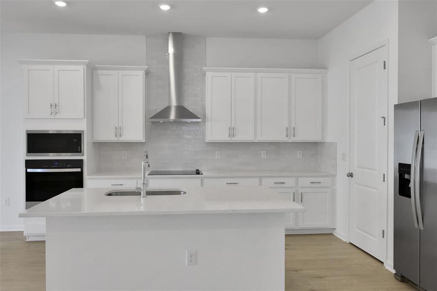 Furnished interior view inside a new home in Serenade at Ovation, Winter Garden (Image 7).