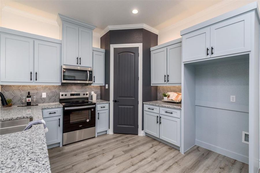 Spacious kitchen with designer paint.