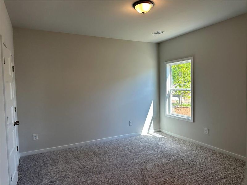 Spacious, unfurnished interior of a new home in Rosewood Lake Preserve, Hoschton (Image 28).