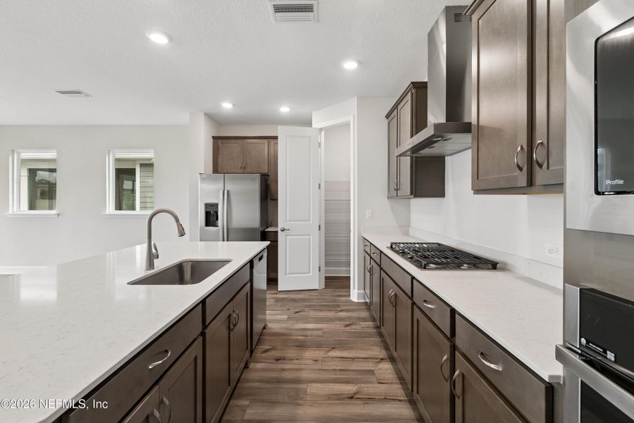 Furnished interior view inside a new home in Tributary 50', Yulee (Image 10).