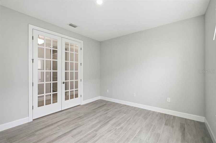 Spacious, unfurnished interior of a new home in Esplanade at Westview, Kissimmee (Image 29).