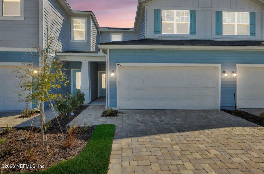 Front exterior of a new home in Brook Forest, St. Augustine, FL, highlighting curb appeal (Image 18).