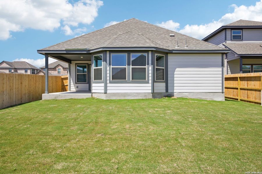 Exterior details and patio area of a home in Kallison Ranch, San Antonio (Image 25).