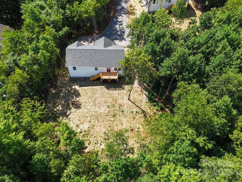 Front exterior of a new home in , Candler, NC, highlighting curb appeal (Image 23). Front exterior of a new home in , Candler, NC, highlighting curb appeal (Image 23).