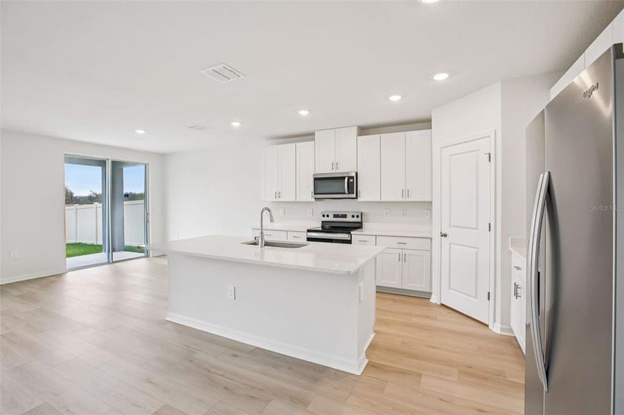 Furnished interior view inside a new home in Two Rivers - Classic Series, Zephyrhills (Image 10).