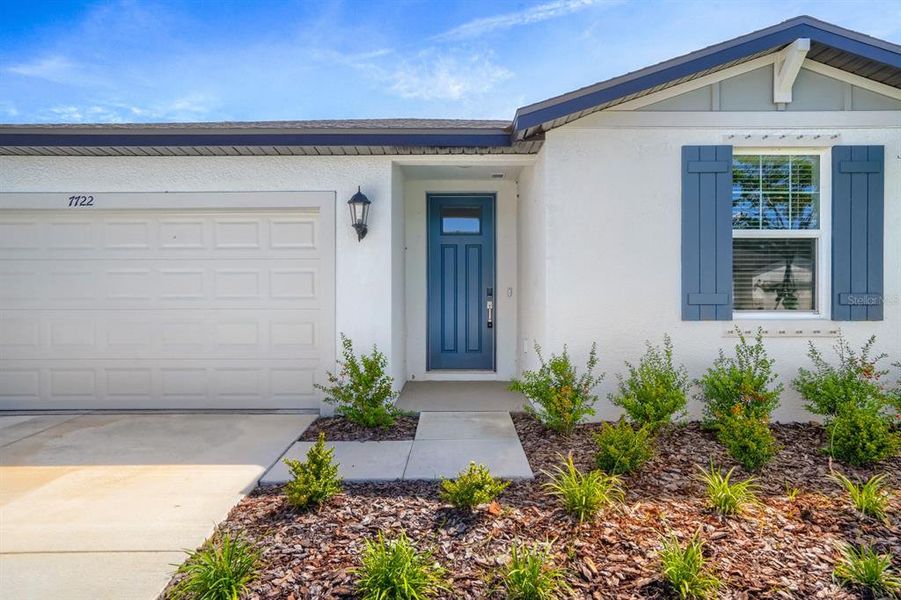Exterior details and patio area of a home in Salt Meadows - Classic Series, Parrish (Image 4).
