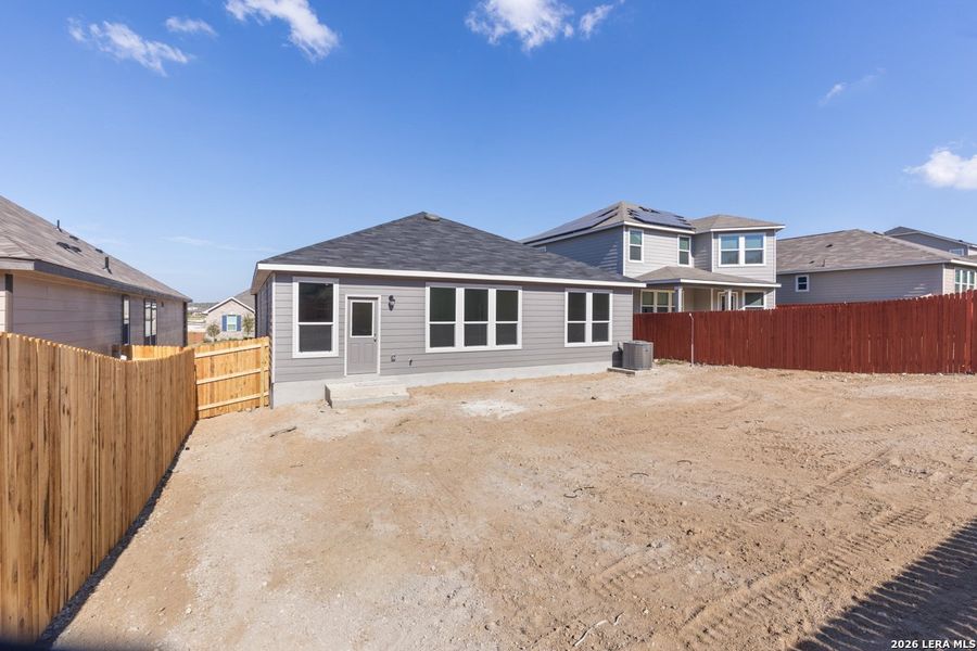 Exterior details and patio area of a home in Hidden Bluffs at TRP, San Antonio (Image 21).