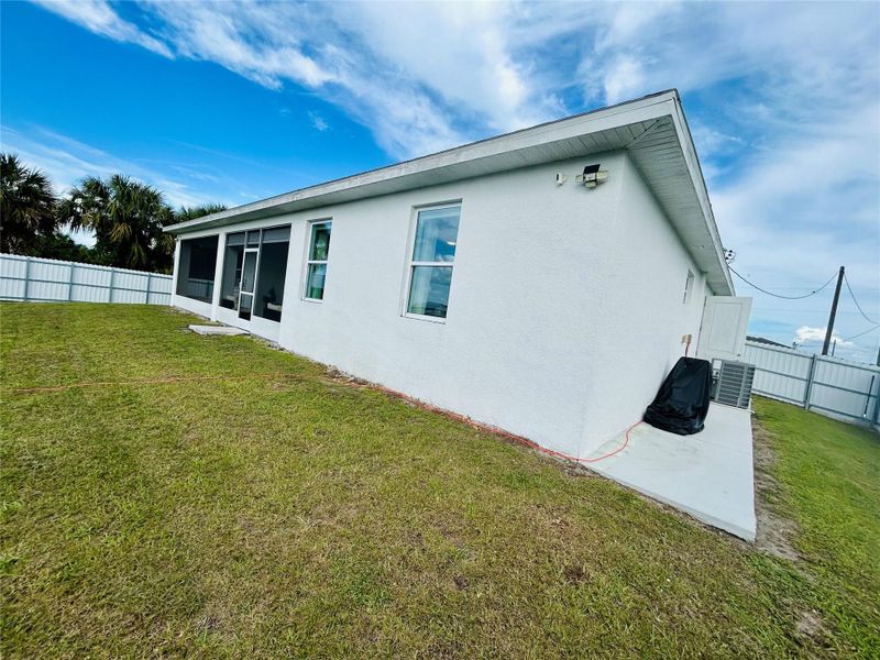 Exterior details and patio area of a home in , Labelle (Image 25).