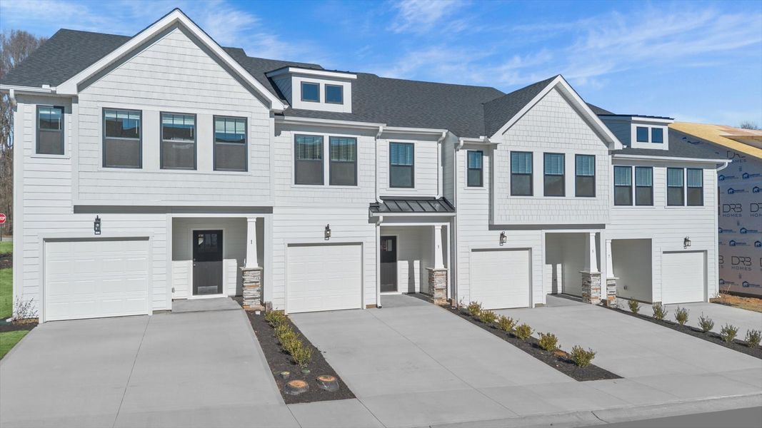 Vibrant townhome exterior in a thoughtfully planned community near city conveniences in Simpsonville, SC