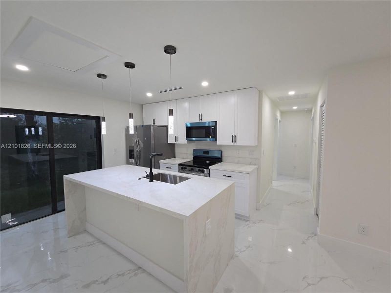 Furnished interior view inside a new home in , Lehigh Acres (Image 7).