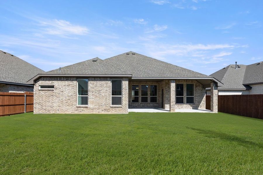 Representative exterior photo of a completed home built from the Cromwell by Impression Homes in Still Water Lake, Godley, TX (Image 23).