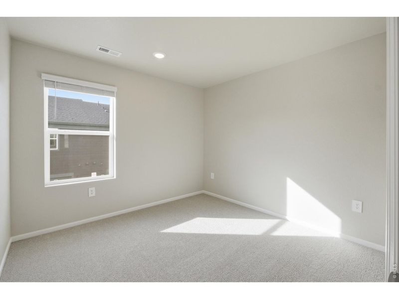 Spacious, unfurnished interior of a new home in Poudre Heights: The Meadow Collection, Windsor (Image 18).