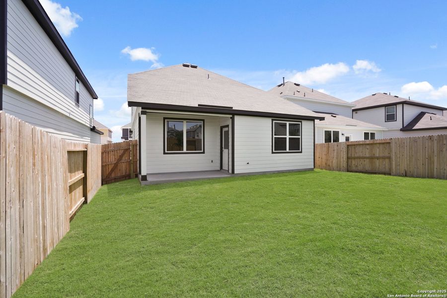 Front exterior of a new home in Timber Creek, San Antonio, TX, highlighting curb appeal (Image 2).