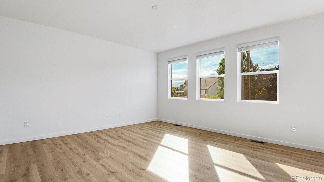 Spacious, unfurnished interior of a new home in Trails at Crowfoot, Parker (Image 41).