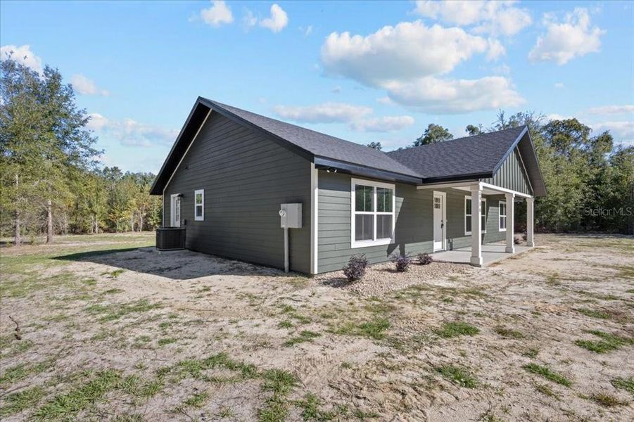 Exterior details and patio area of a home in , Bell (Image 18).