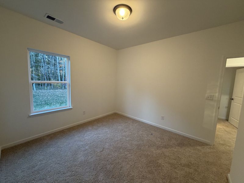 Spacious, unfurnished interior of a new home in Marlin Pointe, White House (Image 9).