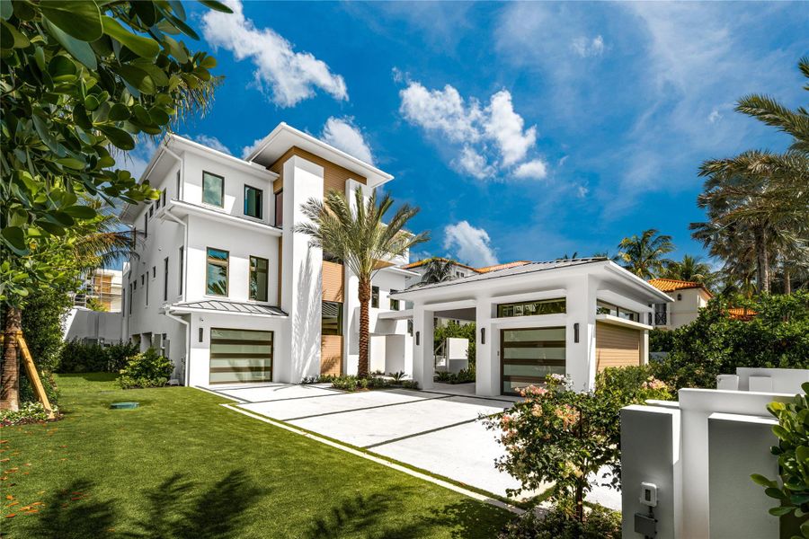 Front exterior of a new home in , Ocean Ridge, FL, highlighting curb appeal (Image 21).